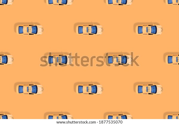 Taxi\
car top view. Seamless pattern on the theme of\
taxi.