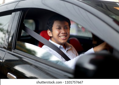 Taxi Driver Man Face Asian Male. Uber Driver Asian Man Smiling. Yogyakarta Indonesia. May 31, 2018