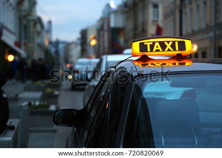 Taxi in the evening on the street