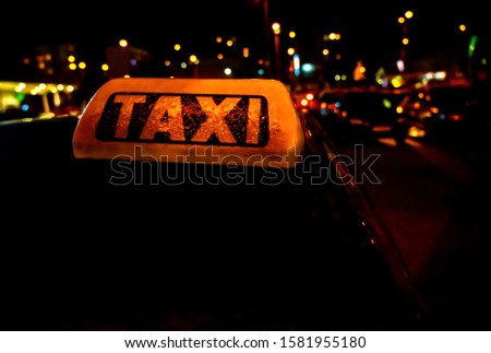 Similar – TAXI Taxi KFZ fahren