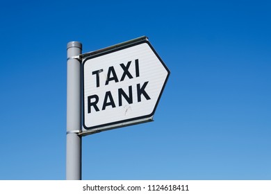 Taxi Rank Sign Blue Sky Background Black Cab Uber Transport Post Queue Wait Signage London
