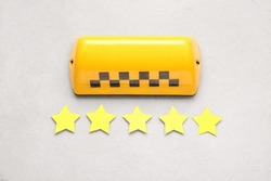 Taxi Roof Sign With Five Stars On Grunge Background. Customer Experience Concept