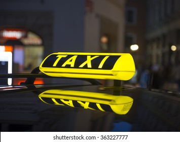 Taxi Sign At Night