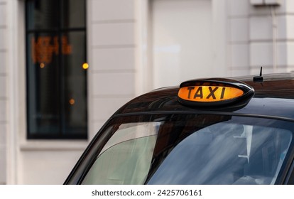 Taxi with it's sign on ready for hire