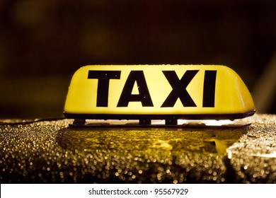 Taxi Sign In Rainy Day