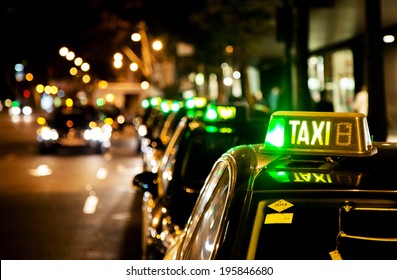 Taxi Waiting Line In A City At Night