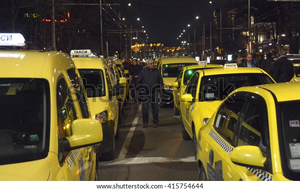 Taxis block the center at 24\
March, 2016 in Sofia, Bulgaria. Taxi drivers protest against\
illegal passenger transport companies, feraing their daily work and\
life