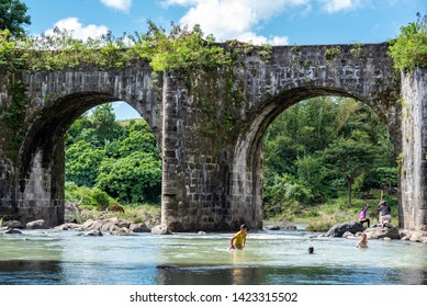 Tayabas, Quezon, Philippines
December 28, 2015
Children Playing Near An Old Spanish Bridge 