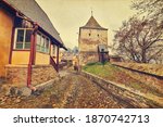 Taylor Tower gate of Sighisoara citadel in Transylvania, Romania, in vintage filter