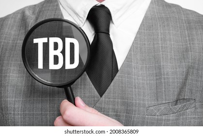 Tbd Acronym Of Master Of Business Administration Degree. Education Concept. Businessman Hands With Magnifier.