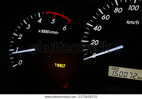 The T-BELT light\
comes on the dashboard of the car. Set the timing for replacing the\
timing belt at 150,000 km.