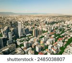 Tbilisi, Georgia -4th july, 2024:Aerial top view Axis towers and city property and business buildings in vake district. Capital city of Georgia with clear blue sky in sunny day