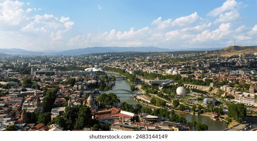 Tbilisi, Georgia. Cityscape view in the sunny day. Old historical buildings, modern architecture, river and green parks. High quality photo - Powered by Shutterstock