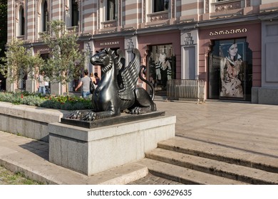 TBILISI, GEORGIA, EASTERN EUROPE - JULY 28TH, 2015 : Bronze dragon sculpture outside the Tbilisi City Assembly building in Freedom Square.