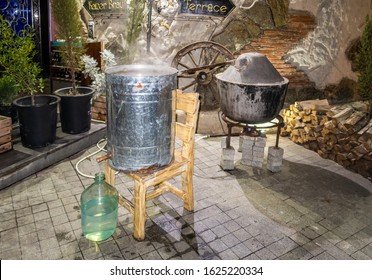 Tbilisi, Georgia, October 13, 2019 : Moonshine Still In The Process Of Making A Drink At The Georgian Restaurant In Tbilisi City In Georgia