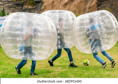 TBILISI, GEORGIA, October 16, 2016: People  in the inflatable balls play bamperbol