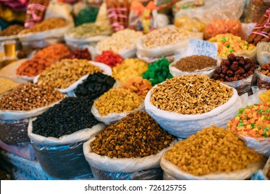 Tbilisi, Georgia. View Of Persian English Common Walnut (Juglans Regia), Succade And Dried Fruits In Bags On Showcase Of Local Food Market.