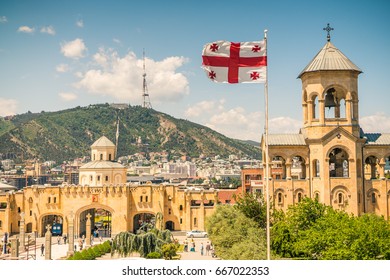 Tbilisi Skyline With Georgian Flag