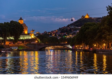 Tbilissi And Kuri River Cityscape At Night Capital City Of Georgia Eastern Europe