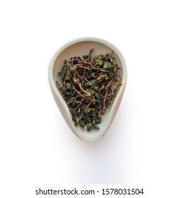 Te Guan Yin Mao Cha Green Tea, Oolong Tea From Cuts In The Cha He Isolated On A White Background, Top View