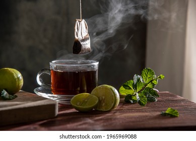 Tea Bag Pulled From Hot Tea Cup