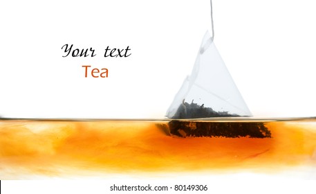 Tea Bag In Water On The White Background