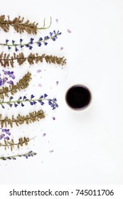 Tea and coffee flat lay/composition made of flowers and leaves. Beautiful and simple