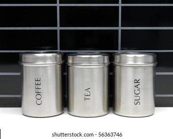 Tea Coffee And Sugar Canisters On A Kitchen Bench