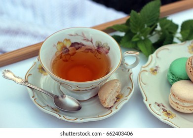 Tea cup with macarons