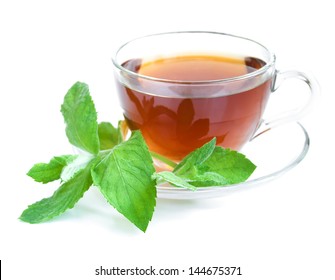 Tea cup with mint leaves on a white background