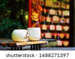 Tea cups and Ema board background, Nonomiya Shrine, Kyoto, Japan, In 2015 Summer.