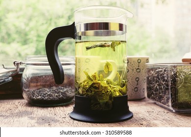 Tea In The French Press On The Table