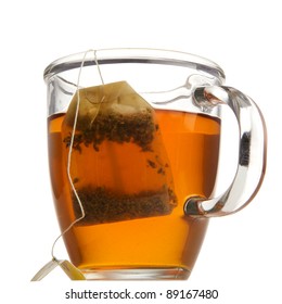 Tea In A Glass Mug With Tea Bag. Studio Isolated On White Background.