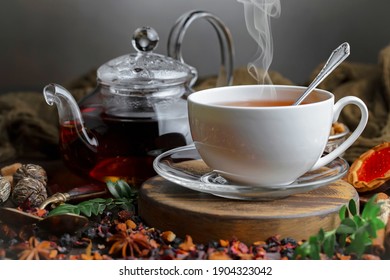 Tea hot drink on old background in composition on the table