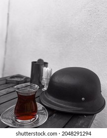 tea and kask on the table.