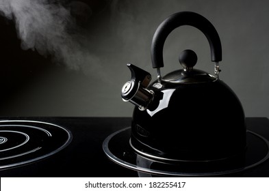 Tea Kettle  With Boiling Water.