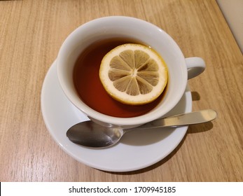 Tea with lemon at cafe.