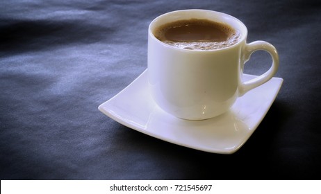 Tea With Milk Or Popularly Known As Teh Tarik, Very Famous In Malaysia On An Isolated Black Background. 