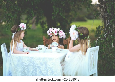 Tea party with adorable little girls - Powered by Shutterstock