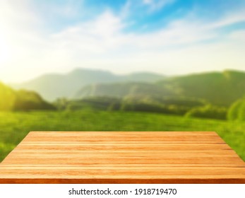 Tea plantation and mountain panorama view with empty Wooden terrace for product display design
