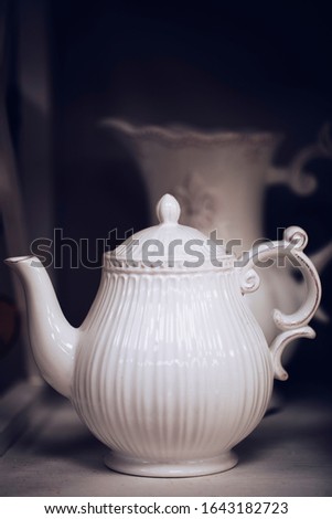 Similar – Tea set on dark background