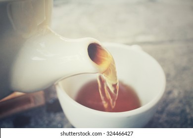 Tea pot with cup