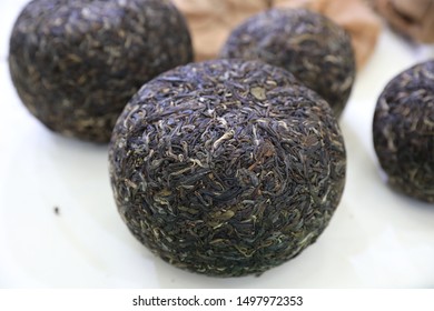 Tea, pu 'er tea, is a kind of tea, produced in yunnan, China.