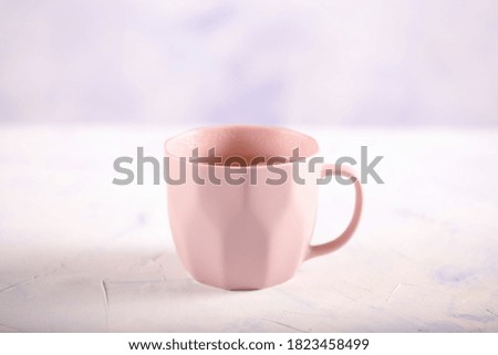 Similar – Image, Stock Photo Cup with yellow herbal tea