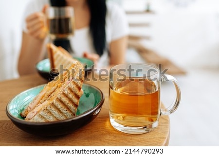 tea sandwich on brown table. High quality photo