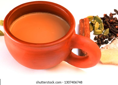 Tea served in a natural clay cup with background