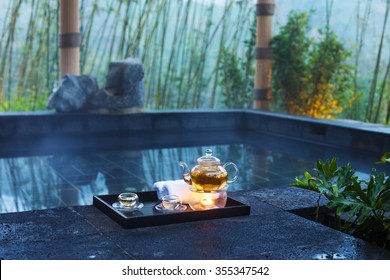 Tea Set On Plate Near Spa Pool