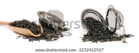 tea strainer with a wooden shovel isolated on white background
