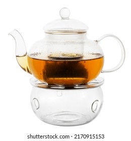 tea in a transparent glass teapot with a stand for warming a candle