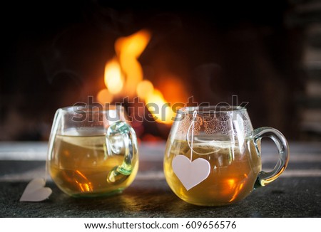 Tea for two by the fireplace